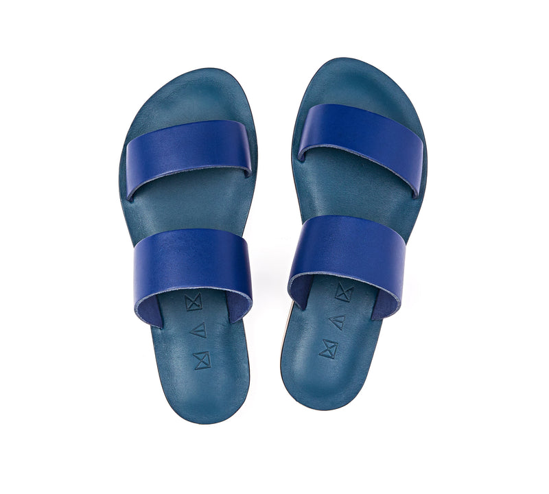 Top view of the handmade Sun women's slip-on leather sandals in night blue / BLUE