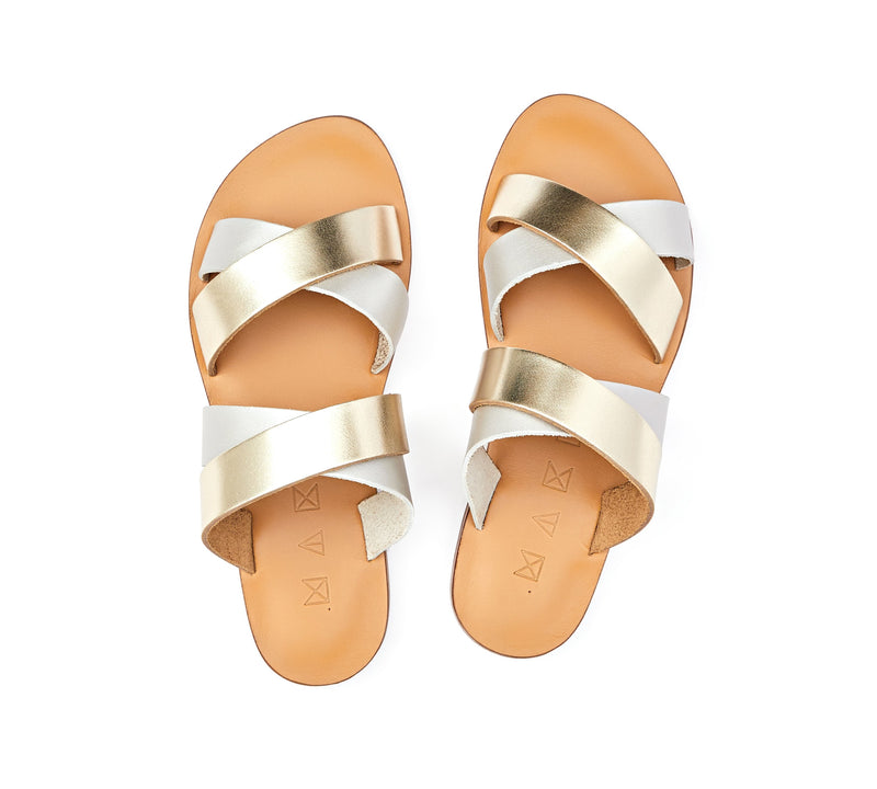 Top view of the handmade Wave women's slip-on leather sandals in natural tan insole with gold and silver straps / GOLD SILVER