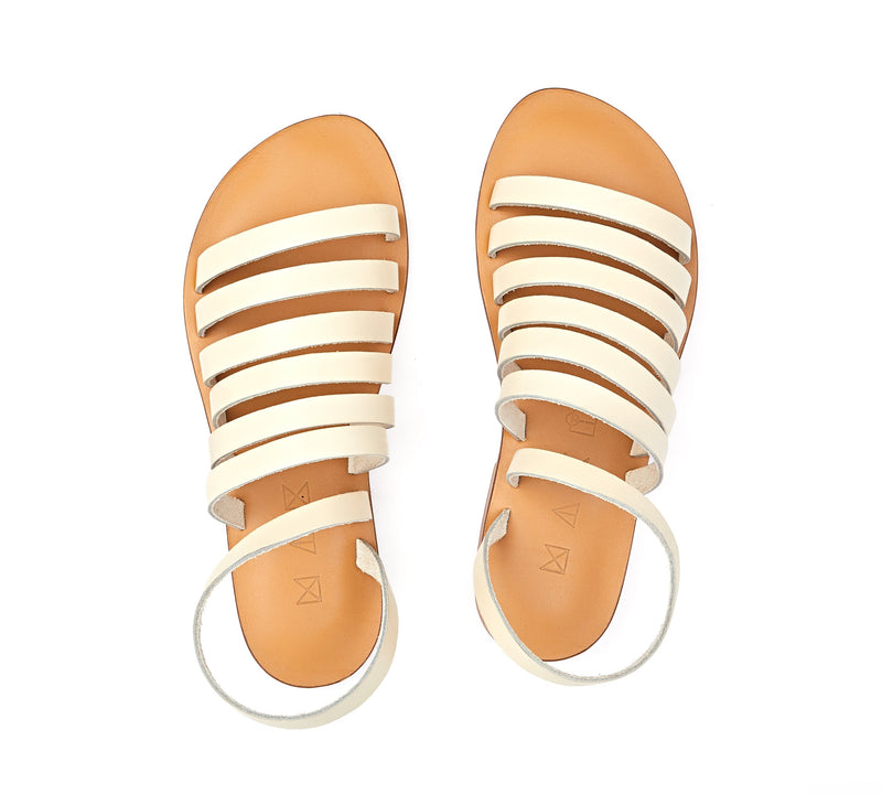 Top view of the handmade Ray women's slingback leather sandals in natural tan insole with cream straps / CREAM