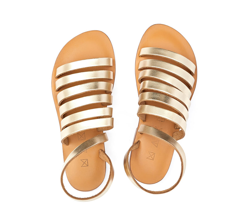 Top view of the handmade Ray women's slingback leather sandals in natural tan insole with gold straps / GOLD