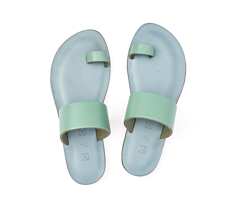 Top view of the handmade Root women's slip-on leather sandals in light grey insole with light green straps / GREEN