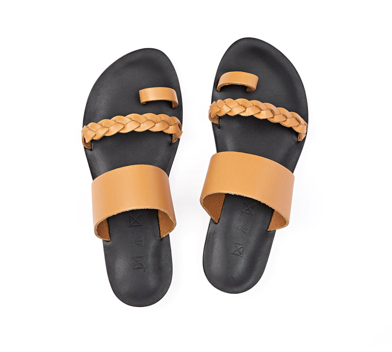 Top view of the handmade Salt women's braided slip-on leather sandals in black insole with natural tan straps / TAN BLACK