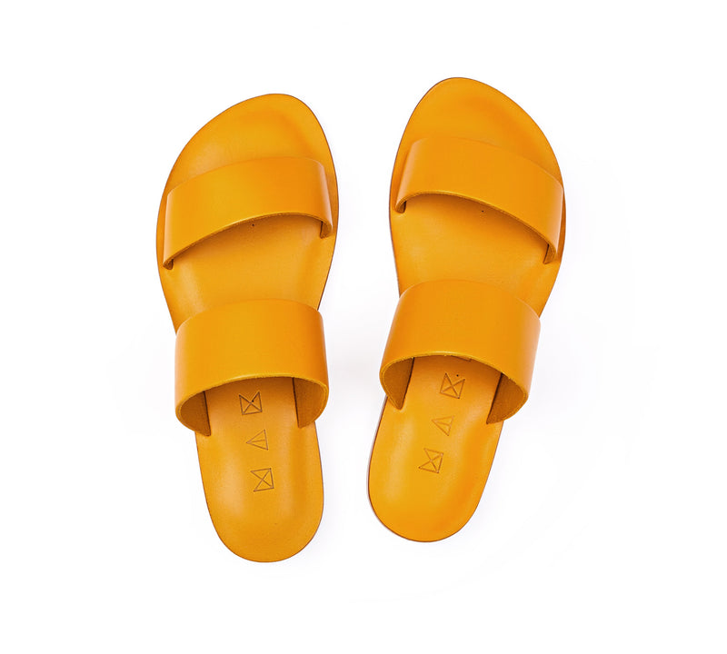 Top view of the handmade Sun women's slip-on leather sandals in yellow / YELLOW