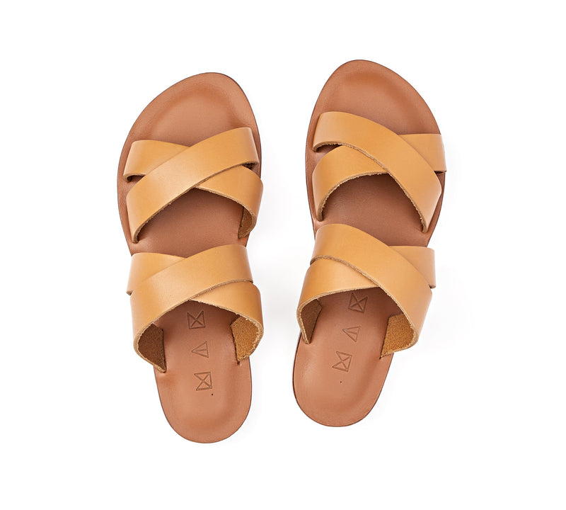 Top view of the handmade Wave women's slip-on leather sandals in light brown insole with natural tan straps / TAN