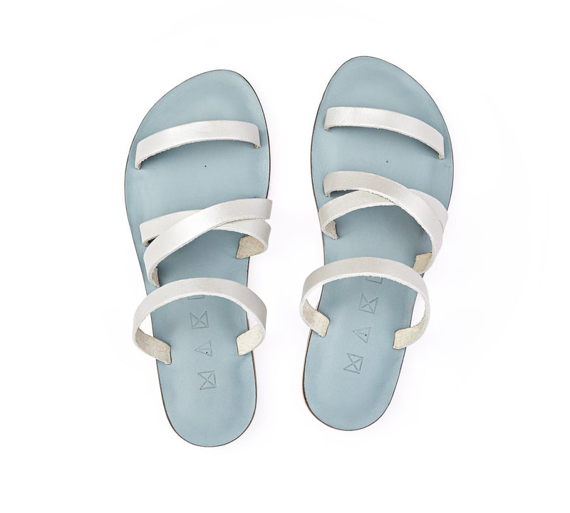 Top view of the handmade Wind women's slip-on leather sandals in light grey insole with silver straps / SILVER