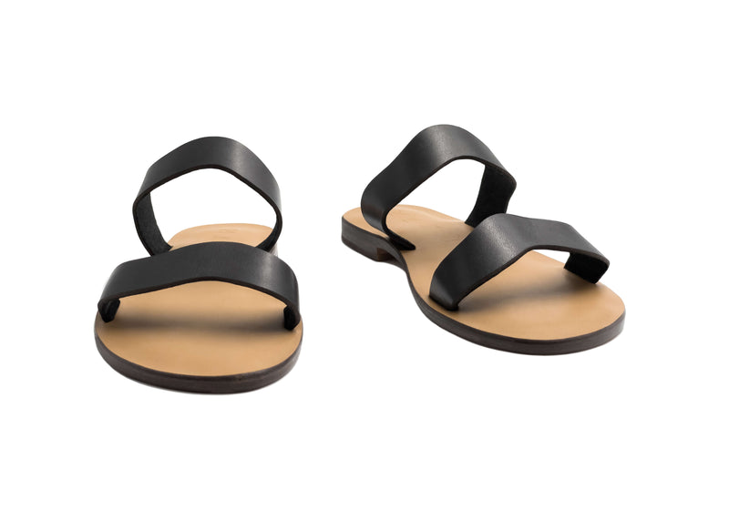 Front view of the handmade Mare women's slip-on leather sandals with tan insoles and black straps / BLACK