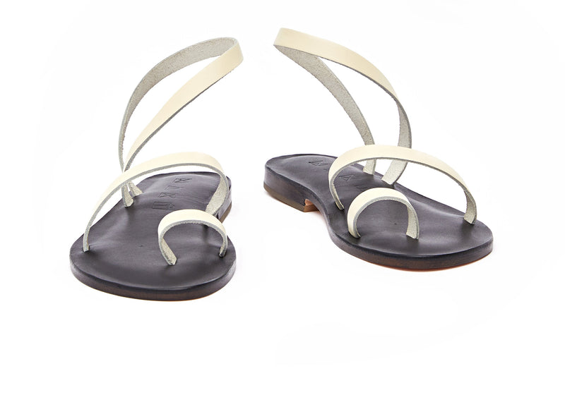 Front view of the handmade Moon women's slingback leather sandals in black insole with cream straps / CREAM BLACK