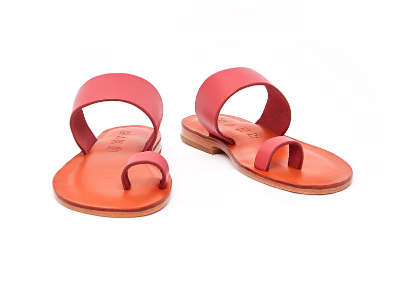 Front view of the handmade Root women's slip-on leather sandals in orange insole with pomegranate straps / POMEGRANATE