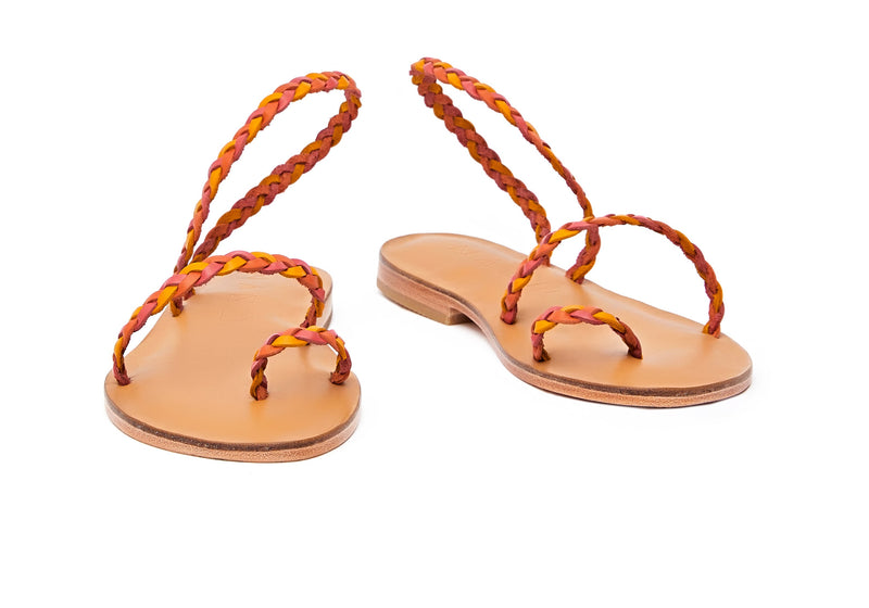 Front view of the handmade Salt women's braided slingback leather sandals in natural tan insole with pomegranate, orange and yellow straps / SUNSET