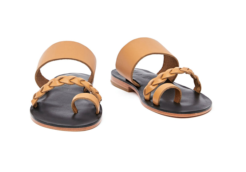 Front view of the handmade Salt women's braided slip-on leather sandals in black insole with natural tan straps / TAN BLACK