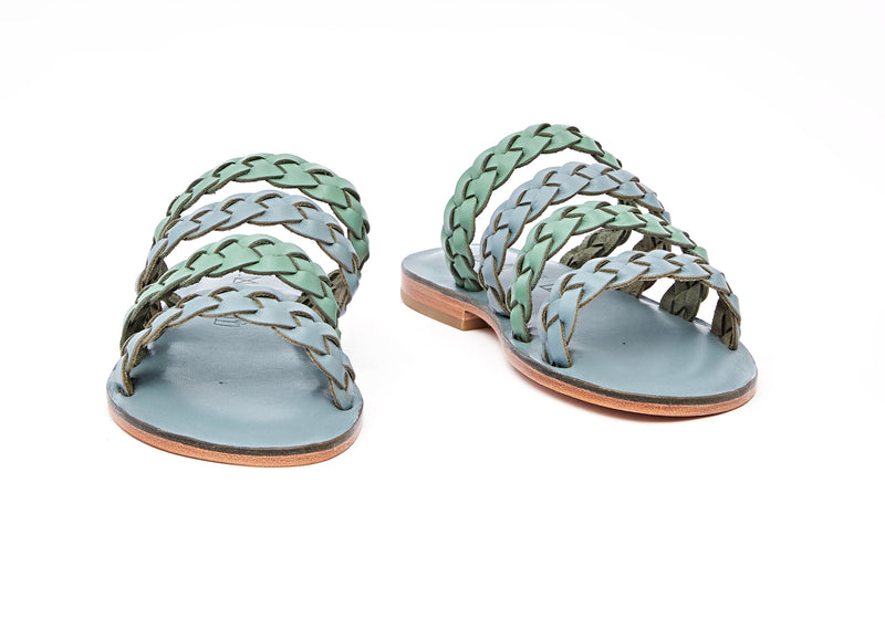 Front view of the handmade Sea women's braided slip-on leather sandals in light grey insole with light green and grey straps / GREY GREEN