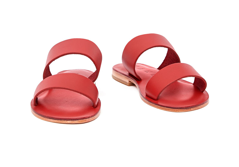 Front view of the handmade Sun women's slip-on leather sandals in red / RED