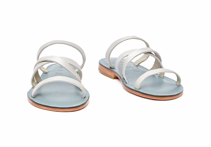 Front view of the handmade Wind women's slip-on leather sandals in light grey insole with silver straps / SILVER