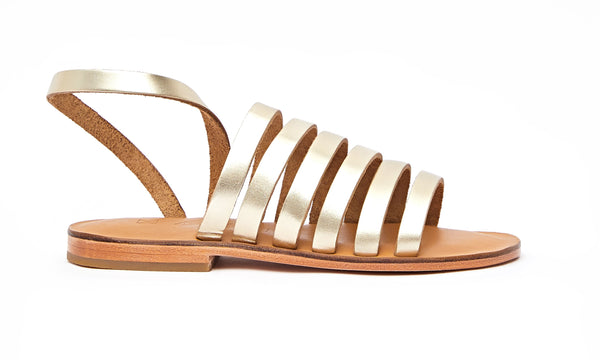 Side view of the handmade Ray women's slingback leather sandals in natural tan insole with gold straps / GOLD
