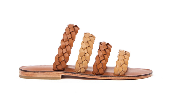 Side view of the handmade Sea women's braided slip-on leather sandals in light brown insole with natural tan and light brown straps / TAN BROWN