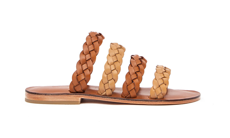 Side view of the handmade Sea women's braided slip-on leather sandals in light brown insole with natural tan and light brown straps / TAN BROWN
