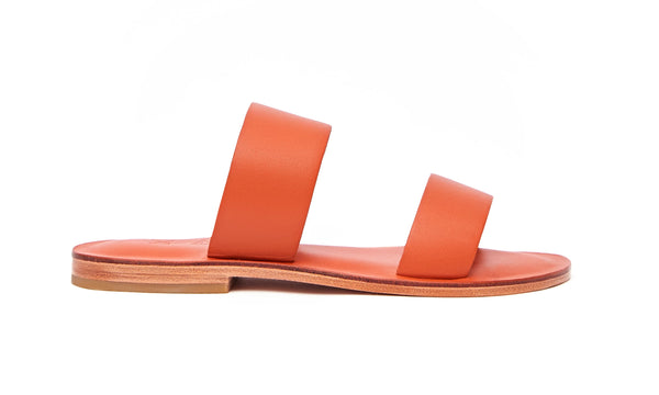 Side view of the handmade Sun women's slip-on leather sandals in orange / ORANGE