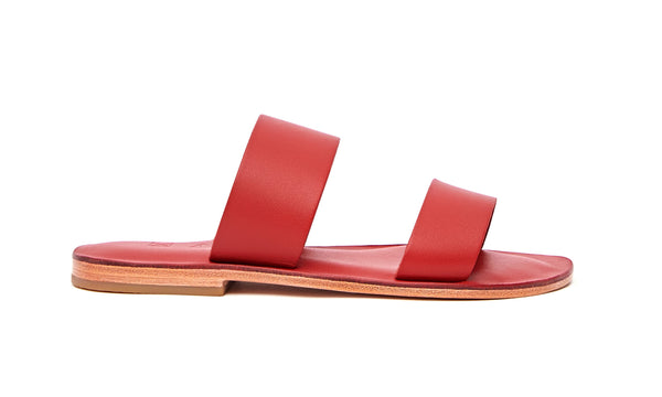 Side view of the handmade Sun women's slip-on leather sandals in red / RED