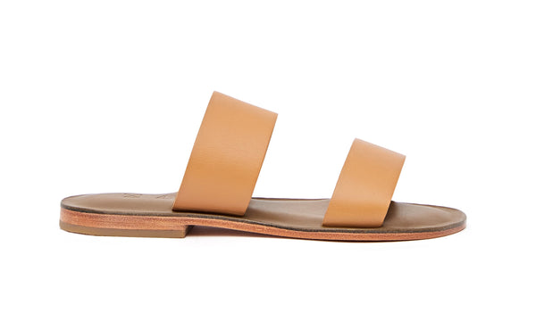 Side view of the handmade Sun women's slip-on leather sandals in olive insole with natural tan straps / TAN