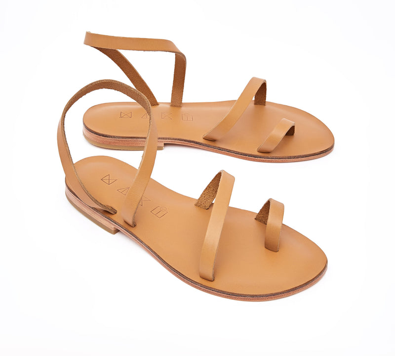 Angled view of the handmade Moon women's slingback leather sandals in natural tan / TAN