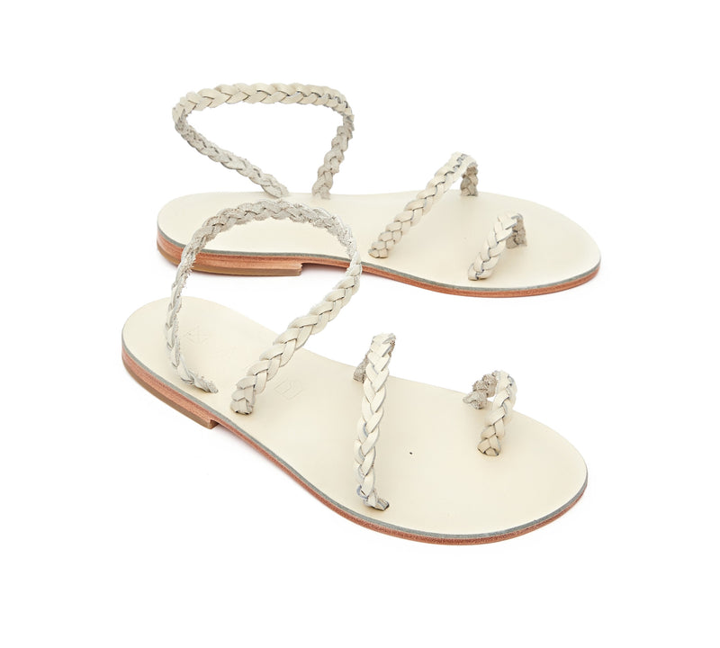 Angled view of the handmade Salt women's braided slingback leather sandals in cream / CREAM